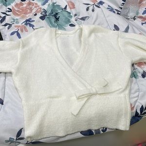 Selling a soft little white cremish top